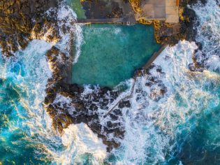 Aerial overlooking Blowhole Point Rock Pool, Kiama